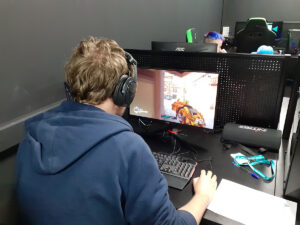 Male student playing Esports