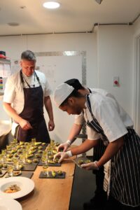 Keanu and Gracjan prepare canapes