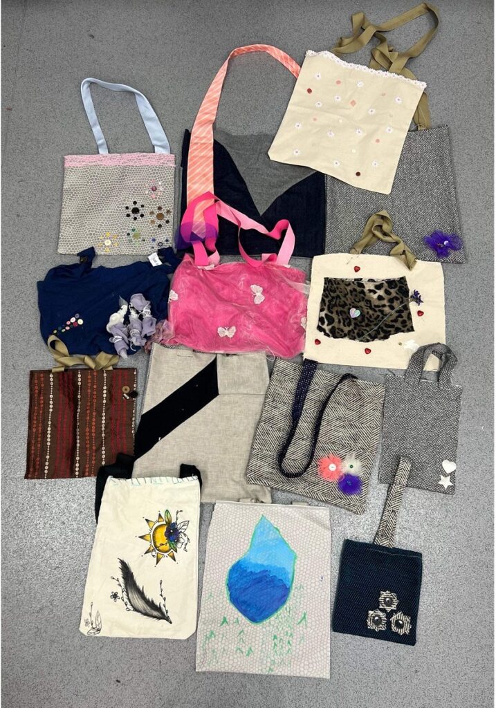 A photo of all of the bags made by the students