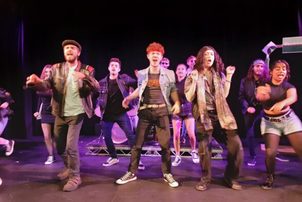 Reading College Performing Arts students performing Rock of Ages Teen Edition