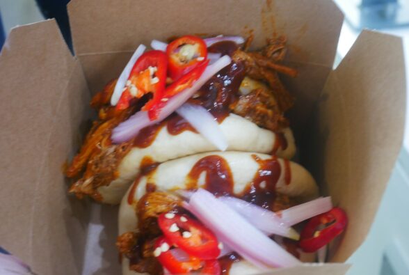 Pulled pork bao buns, served with pickled shallots, chilli and coriander