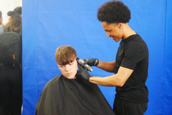 Student category winner, Tyron Oyebade, Barbering Level 2 student creating his winning haircut