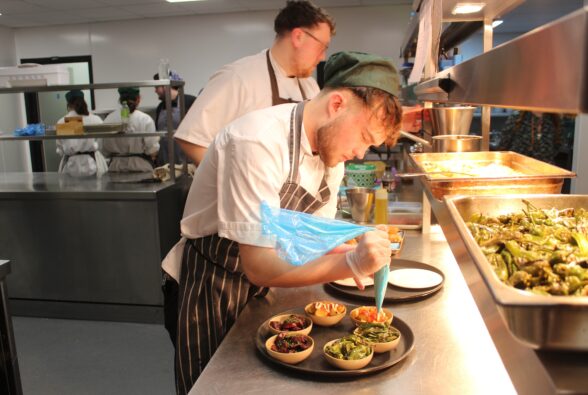 A Professional Culinary Arts student from Reading College prepares Tapas in The Kitchen