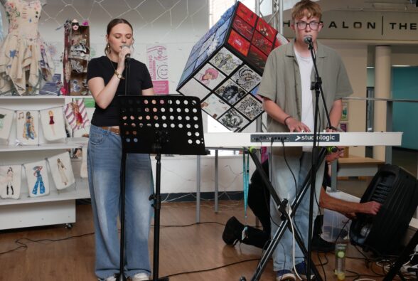 Two music students performing at the Private View.